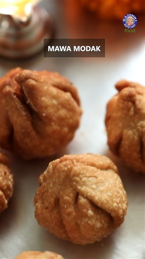 Join me as I show you how to make the ultimate Fried Mawa Modak (Khoya Modak) – they are crispy on the outside, incredibly soft and rich on the inside! Watch the entire recipe on our Rajshri Food YT Channel. Host: Chef Ruchi Bharani Ingredients: 200 grams Khoa/Mawa, grated 1 tsp Ghee 2 tbsp Rawa (Semolina) 1 ½ tbsp Pistachio flakes 1 ½ tbsp Almond flakes 1 ½ tbsp Raisins 1 tsp Cardamom powder 2 tbsp Desiccated Coconut ¼ tsp Saffron strands (soaked in milk) 5-6 tbsp Powdered Sugar Oil for frying