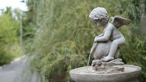 Little Angel Cupid Boy Fountain Pours Stock Footage Video (100% Royalty-free) 1038272447 | Shutterstock