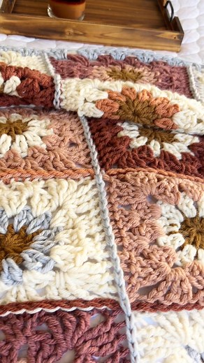 Well, fall stuff is showing up in my feed now, so here’s my contribution! 🌼 It’s seeming a little early to think of fall and Halloween, but my heart did do a little pitter patter when I saw some fall things at the store the other day. Autumn equals yarn season and coziness, right? This blanket sort of works for fall and summer because you can bust out the flower squares by the pool this summer and put them together this fall for a cozy blanket. I hope you are enjoying summer, my friends! XO Jes
