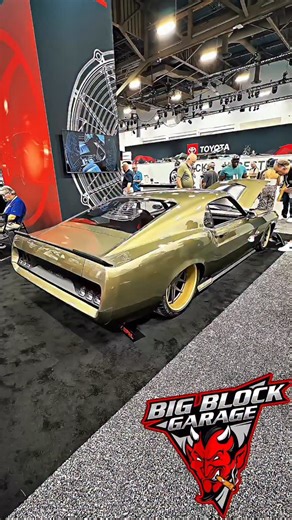 17K views · 252 reactions | SEMA 2025 just got lit with SPAL’s custom ’69 Mustang—Titan Green, slammed, and dripping with handcrafted attitude. Designed by Sean Smith and built by Vini’s Hot Rods, this beast blends classic muscle with avant-garde luxury inside and out. #ford #mustang #mach1 #fordmustang #sema2025 #sema #bigblockgarage #musclecar #restomod #car #cars | Big Block Garage | Facebook