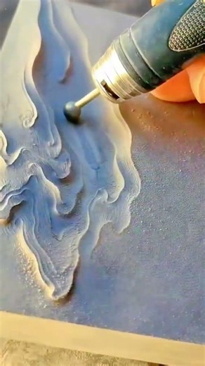 engraving fluid wave patterns on a flat surface using a high speed rotary tool for artistic