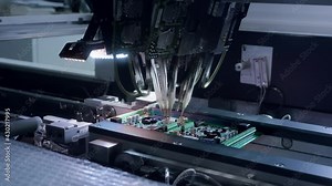 Printed circuit board without electronic components ready for assembly. Technological process. Needle automatic equipment diagnose and test chips and processors. Installation of SMD components