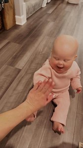 We learned high fives recently, but of course in Ozzy fashion, today she decided foot fives are more her style 👣😜 She mostly likes to give fives to her dad after he tells a bad joke, and then they both laugh hysterically together. Will have to record this next 😂 | Jess Hentges