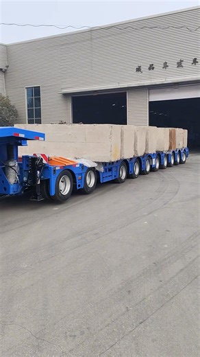 Load testing our new 10-axle lowboy trailer.