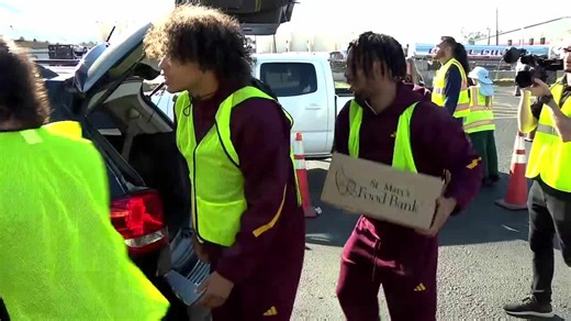St. Mary's Food Bank volunteers pack vehicles with holiday meals ahead of Thanksgiving