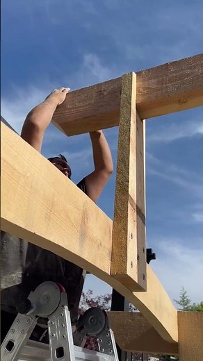 Installing the Ridge beam on the garden structure.