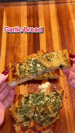 Warm, toasty, cheesy and garlicky - this hits everytime. Add it to your holiday meal! 1. Split a loaf of choice 2. Preheat oven to 400° 3. Super soft butter (1/2 cup, salted), mix with 5 cloves chopped garlic, chopped parsley, 1/2 cup Parmesan, salt and pep to taste 4. Spread all over bread and bake for 15-20 min or until nicely toasted. You can broil for a couple of minutes at the end to get the cheese brown #garlicbread #garlic #cheesybread #foodtiktok #bread