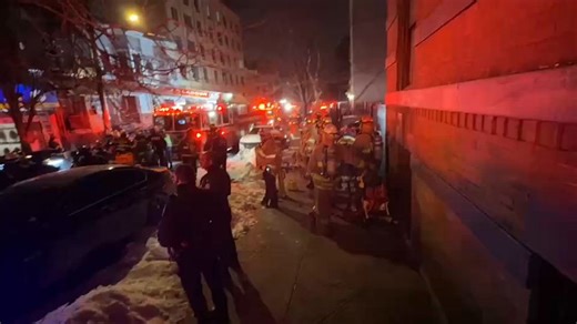 2 firefighters injured after 4-alarm inferno breaks out inside Concourse Village home, leading to partial collapse