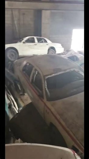 where thousands of Crown Vics are left to rot