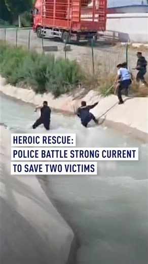 Heroic Rescue: Police battle strong current to save two victims