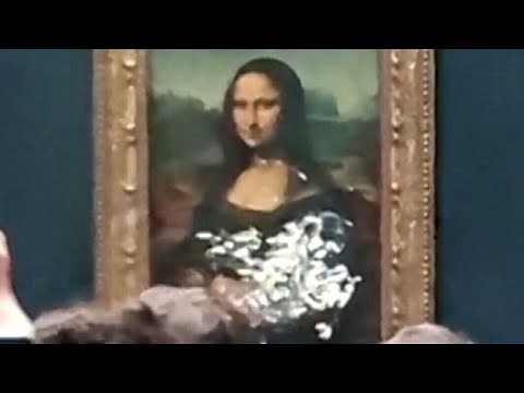Climate protester throws cake at Mona Lisa painting