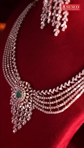 All eyes on you with dazzling diamonds and eternal allure. For the woman who shines brighter every season. Make every moment sparkle with the Dhanteras Shagun Collection. #DhanterasShagunCollection #DiamondNecklace #LuxuryJewels #EmeraldElegance #SencoGoldAndDiamonds | Senco Gold & Diamonds