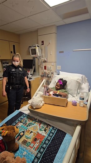Blue Santa and his helpers from the Creve Coeur Police Department made their annual rounds to visit Mercy Kids. The officers and their families raise money and collect toys starting in November to help brighten spirits of the little ones who miss out on holiday activities while in the hospital. | Mercy Hospital St. Louis