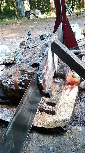 drag saw cutting petrified wood