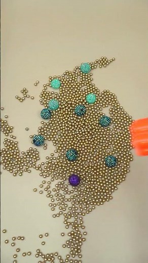 Mesmerizing Bead Cascade 🖤✨💛#reverse #beads