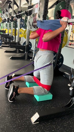 Band-Resisted Kneeling Hip Extension (Smith Machine)