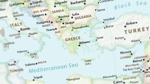 Greece on a political map of the world. Video defocuses showing and hiding the map (4K UHD).
