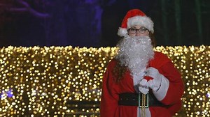 Who comes bearing Christmas presents in Europe?