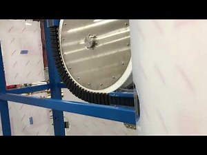 Side Grip Elevation Conveyor ("Gripper") by Multi-Conveyor