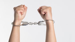 Canada’s ‘Crypto King’ and Associate Arrested, Charged With Fraud in Alleged $30M Ponzi Scheme