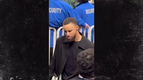 Celtics Fan Pulls on Steph Curry's Arm During Game