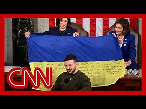 Zelensky unveils Ukraine battle flag during speech to Congress
