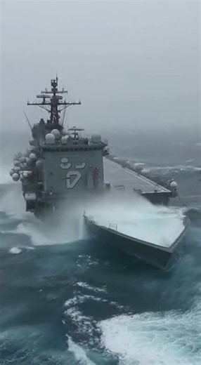 Amphibious assault ship navigating the North Atlantic gale 🚢