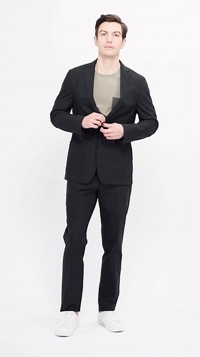 A suit that redefines convenience without compromising on style. 👔 Our washable suit comes with a washable, reusable bag so you can wash and go. #KennethCole #MensStyle #WashableSuit | Kenneth Cole