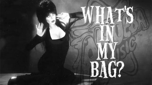 Elvira doing a 'What's in my Bag?' video before it became the standard to promote a project... icon
