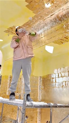 applying reflective insulation sheets onto ceiling surface #shorts