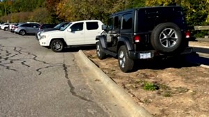 Couple shares frustration over parking issue after car towed at Asheville Regional Airport