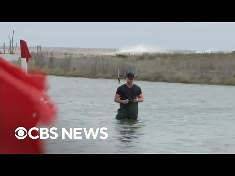 Hurricane Erin bringing coastal flooding to New York as it churns off East Coast