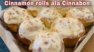 Cinnamon roll ala Cinnabon Recipe Bread flour-400g ( 3 1/4 cups) Sugar - 60g ( 1/3 cup) Salt -4g ( 1/2tsp) Powdered milk -10g ( 1tbsp) Unsalted Butter -60g ( 1/4 cup) Bread improver-4g (1tsp) Instant dry yeast- 7g (1 1/2 tsp) Egg- 1pc Water - 140ml (1/2cup and 1tbsp) Filling Unsalted butter -50g ( 1/4cup) Cinnamon powder -5g (1tsp) Sugar - 80g (1/3 cup) Toppings Cream cheese -100g( 1/2 cup) Butter -20g (1tbsp) Milk - 30ml (2tbsp) Icing sugar -100g (1cup) Crushed nuts | Baking tutorials