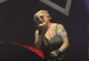 Watch: TOOL's MAYNARD JAMES KEENAN Dons Fake Breasts And Lipstick At Florida Festival In Response To RON DESANTIS's Anti-Drag Bill