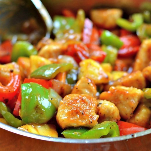 This one skillet Sweet and Sour Chicken Recipe brings crunchy pan fried chicken together with sweet bell peppers and pineapple in a lightly sweetened sauce. It is a family favorite and comes together in about thirty minutes. Full Recipe Here: https://www.smalltownwoman.com/sweet-sour-chicken/ | Small Town Woman