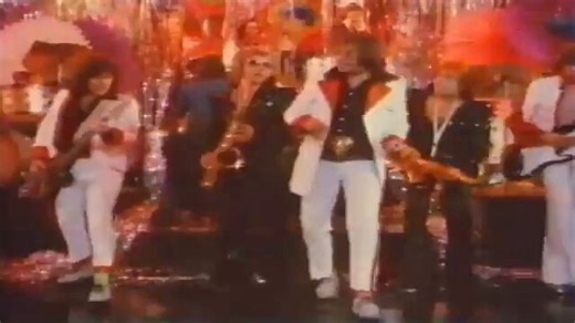 Never Too Young To Rock (1975). "In the late 1970's rock 'n' roll was to be banned from television..."So Peter Denyer and Freddie Jones tour the country in a rock 'n' roll detector van, gathering the best glam rock bands they can find to put on a concert, pursued by the shadowy enemies of music who hate the youth of today. Haunted houses, football hooligans, an army assault course and Midge Ure are all involved and in the end rock 'n' roll is saved. It's actually a good movie!