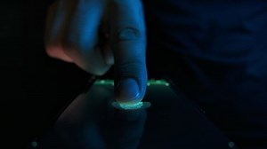 Person Activate Id in Fingerprint Scanning on Tech Device Panel Close-up. Human Turn on Neural Network Visualization Hologram. Concept of Digital Start Identification Sensor Screen in Industry Four 4k