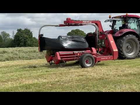Baling and plastic wrapping hay