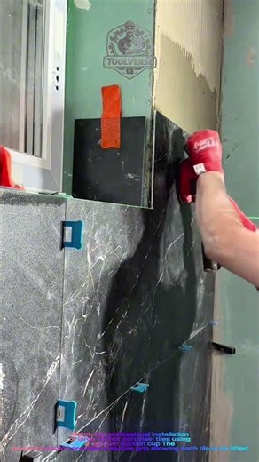 Professional Large Format Tile Installation Using a Vacuum Suction Cup | Precision Tile Placement