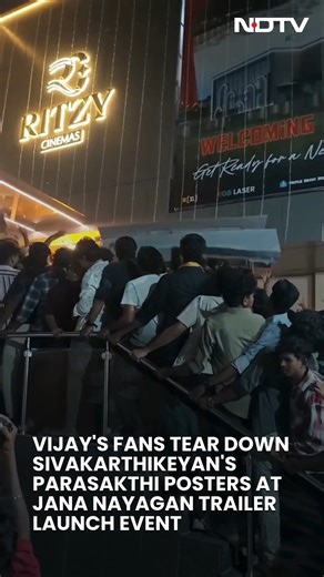 Vijay's Fans Tear Down Sivakarthikeyan's Parasakthi Posters At Jana Nayagan Trailer Launch Event In Madurai | NDTV