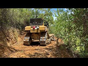 Conquering Steep Cliffs with a D6R XL Bulldozer for a New Road