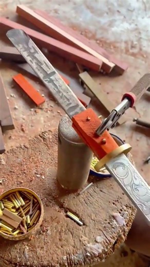 artistic and traditional hand-assembly of a decorative metal sword