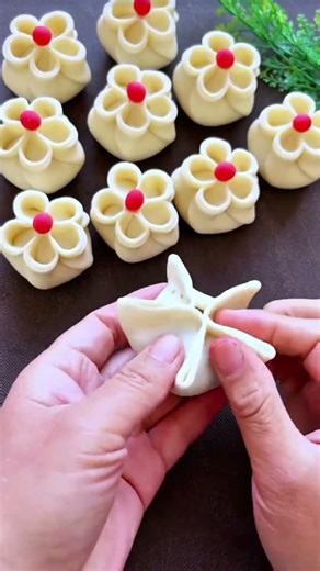 This is the process of shaping food into beautiful flower forms with careful hands and simple tools