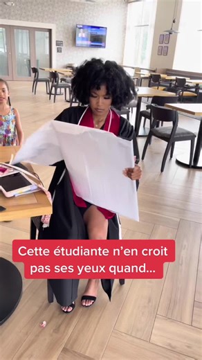 Exciting Graduation Celebration at a Modern Café