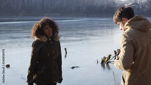 Couple taking self portrait using digital camera at forest Stock Video