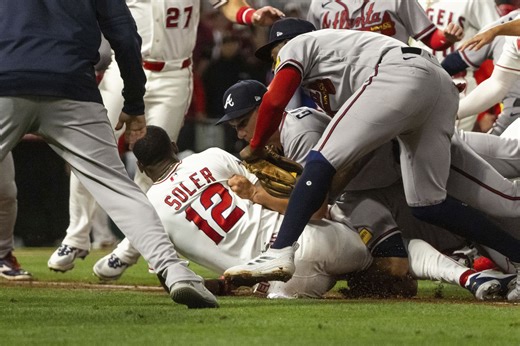 Brawl breaks out between Atlanta pitcher Lopez and Angels DH Soler