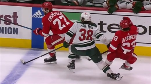 Wild’s Hartman takes out Red Wings’ DeBrincat with apparent slew foot