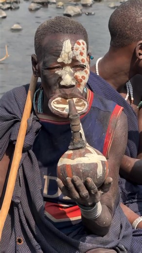 Among the Surma people of Ethiopia, face painting is more than decoration — it’s living art. 🎨 Using clay, charcoal, chalk, and natural pigments, each person creates unique patterns inspired by nature — dots, lines, and shapes that express identity, beauty, and spiritual protection. These artistic designs unite the community during rituals, celebrations, and daily life, reflecting the deep connection between art, culture, and the human spirit. 🇪🇹✨ #InspirationOfAfrica #SurmaTribe #EthiopiaCul
