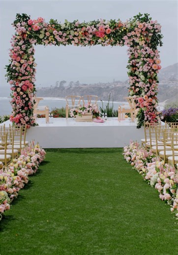 Bold blooms against endless blue. We designed vibrant florals for a cliffside ceremony at @ritzcarltonlagunaniguel, where color meets coastline and every detail is intentional. {Floral Design by Square Root Designs} 🌊 CREATIVE LOVE LIST @aneesa.harmonyweddings @bethany.harmonyweddings @squarerootdesigns @chrisjevansphoto @ritzcarltonlagunaniguel @3dsounds . . . . #squarerootdesigns #ritzcarltonhotel #ritzcarlton #luxuryflorist #floraldesign