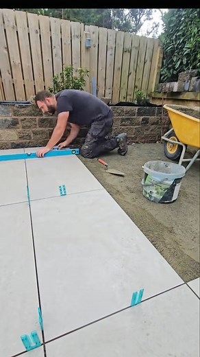 installing porcelain paving | Tdlandscapes | Facebook